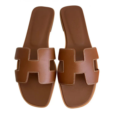 "H" ORN sandals